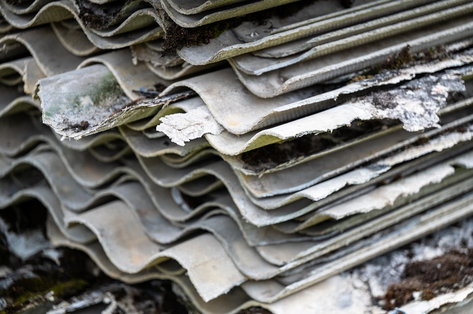 Image of A,pile,of,asbestos,removed,from,an,old,roof.,hazardous