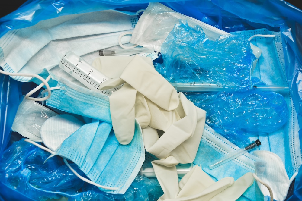 Image of Medical,trash.,coronavirus,protection,equipment,in,medical,waste,bin.,used